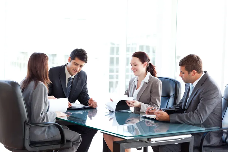 HR professional analyzing payroll analytics reports