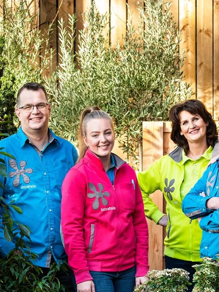 Intratuin team among the plants in their garden centre