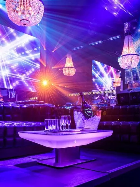 VIP tables under the lights at Escape Amsterdam