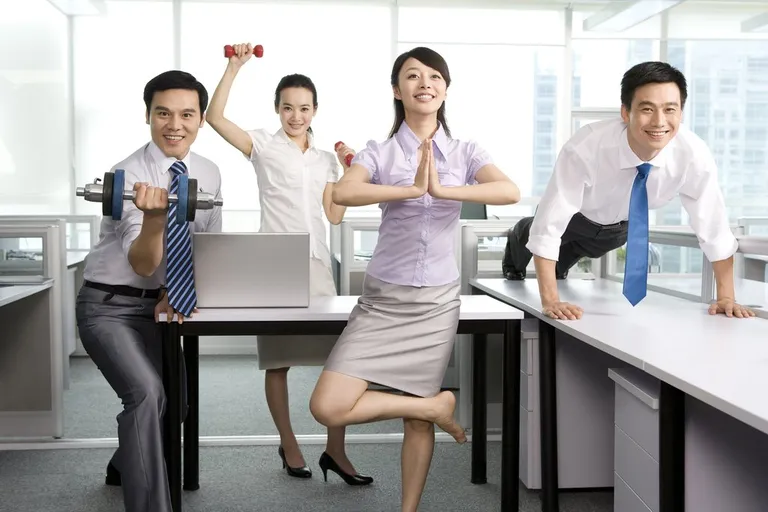 Keeping fit in the office — stretching at desk