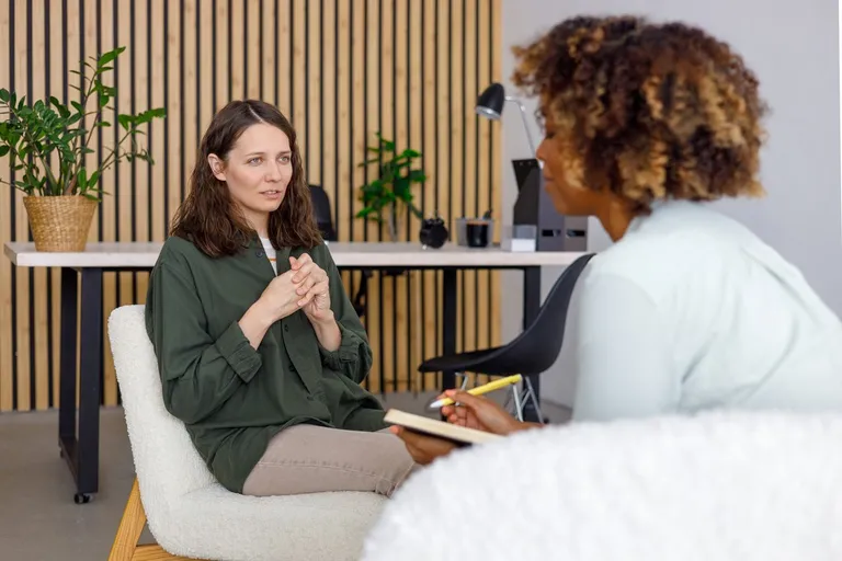 Female psychologist conducting an exit interview