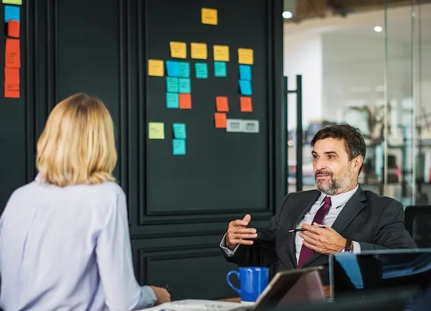 senior executives discussing strategy in meeting room