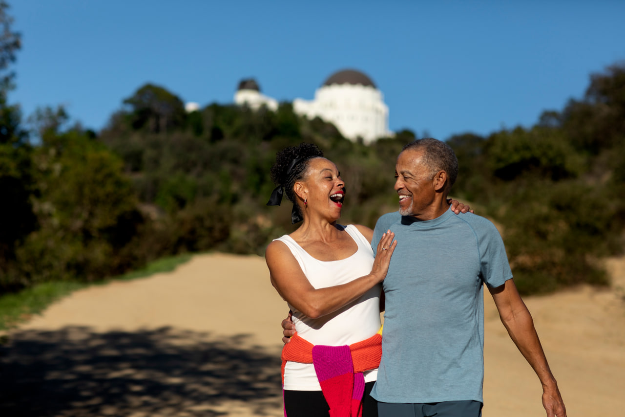 Senior couple embracing outdoors — Sequel, curated dating app for over 50