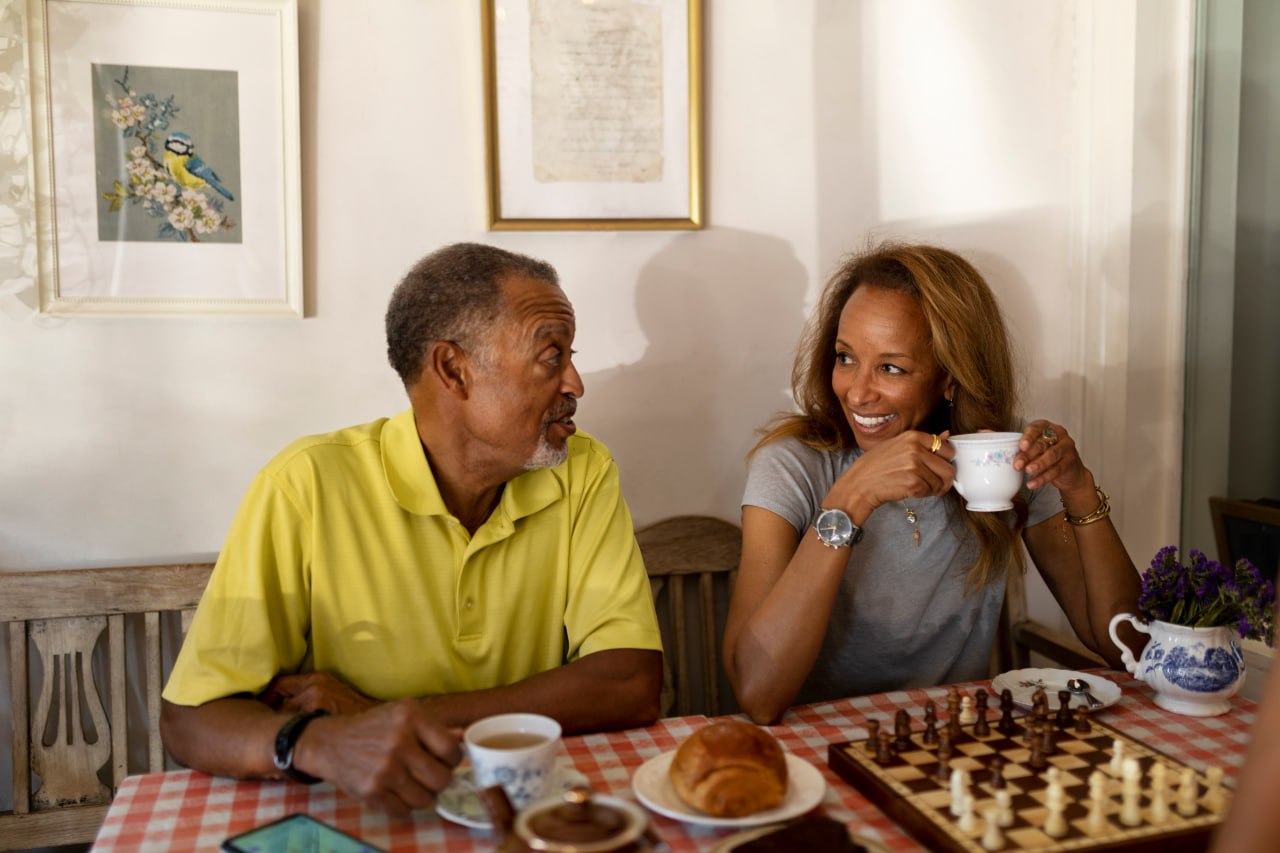 Senior couple smiling together — start your dating journey with Sequel
