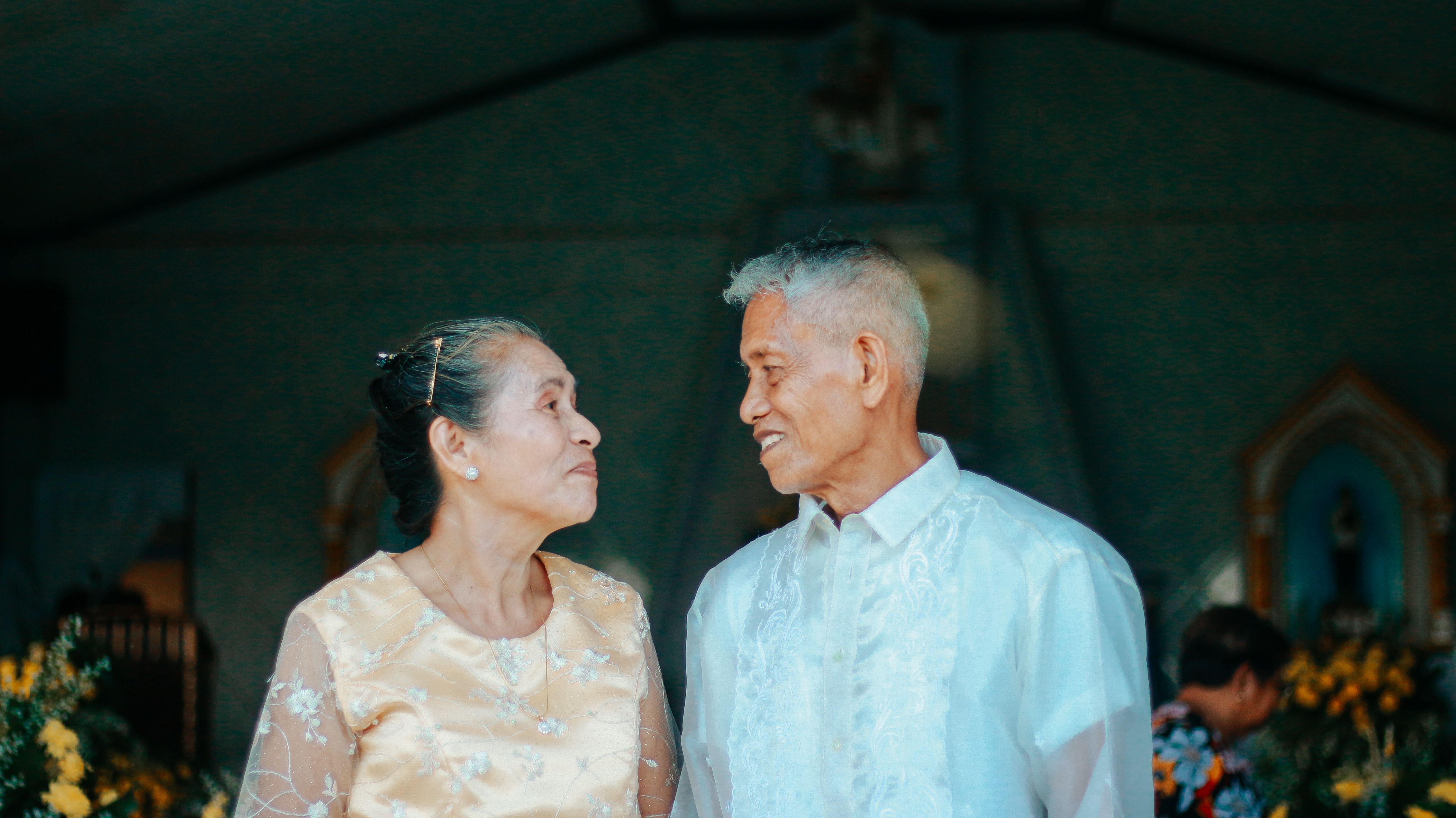 Asian couple looking at each other