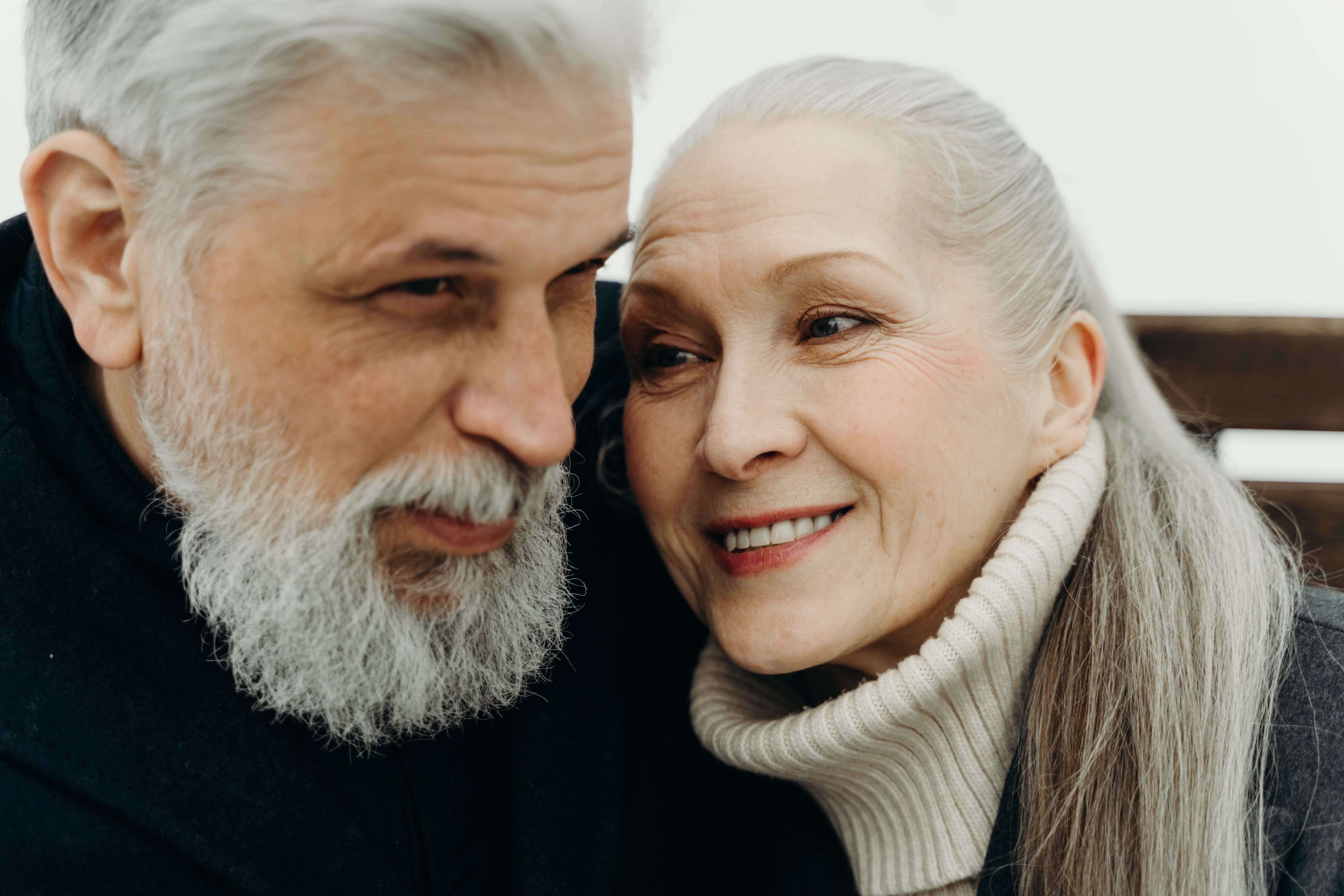 Senior couple smiling together — start your dating journey with Sequel