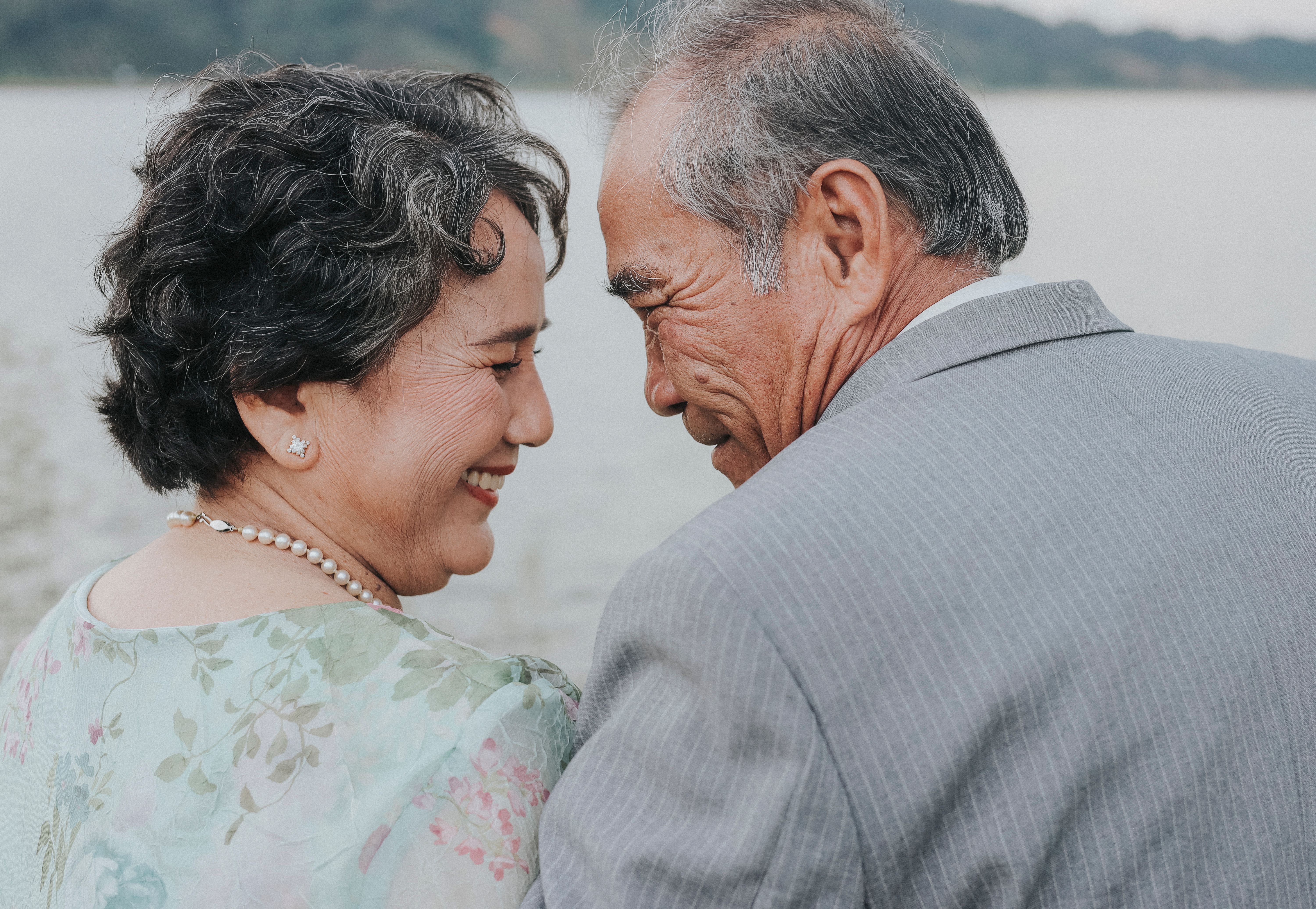 Senior couple smiling together — start your dating journey with Sequel