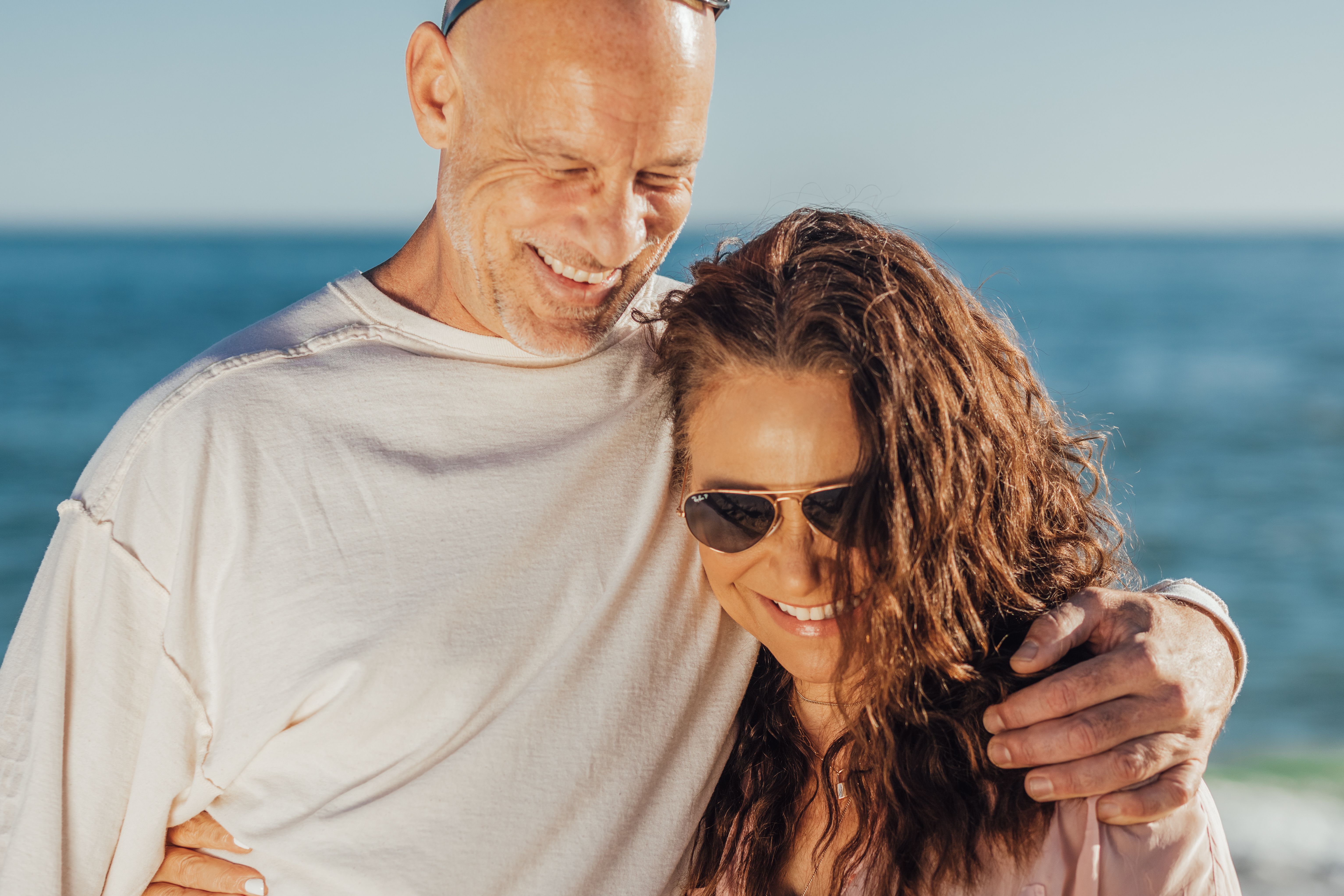 Mature couple enjoying wine outdoors — Sequel Dating App blog