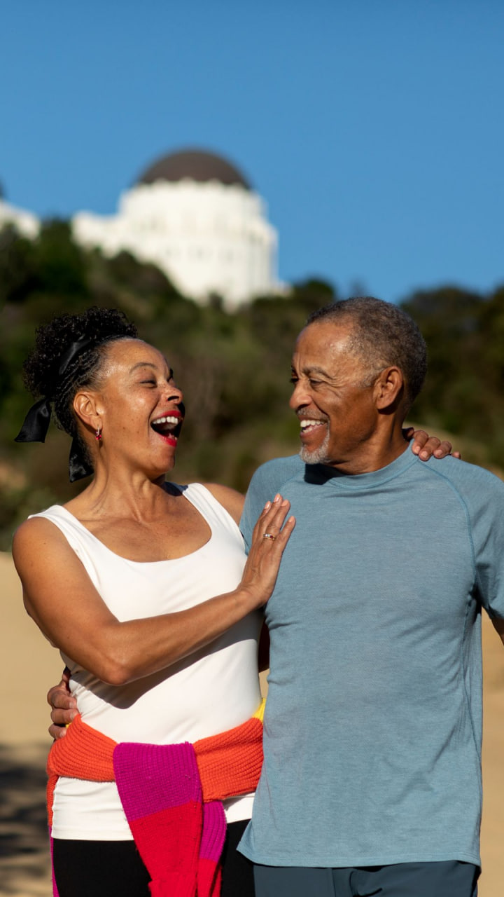 Senior couple embracing outdoors — Sequel, curated dating app for over 50