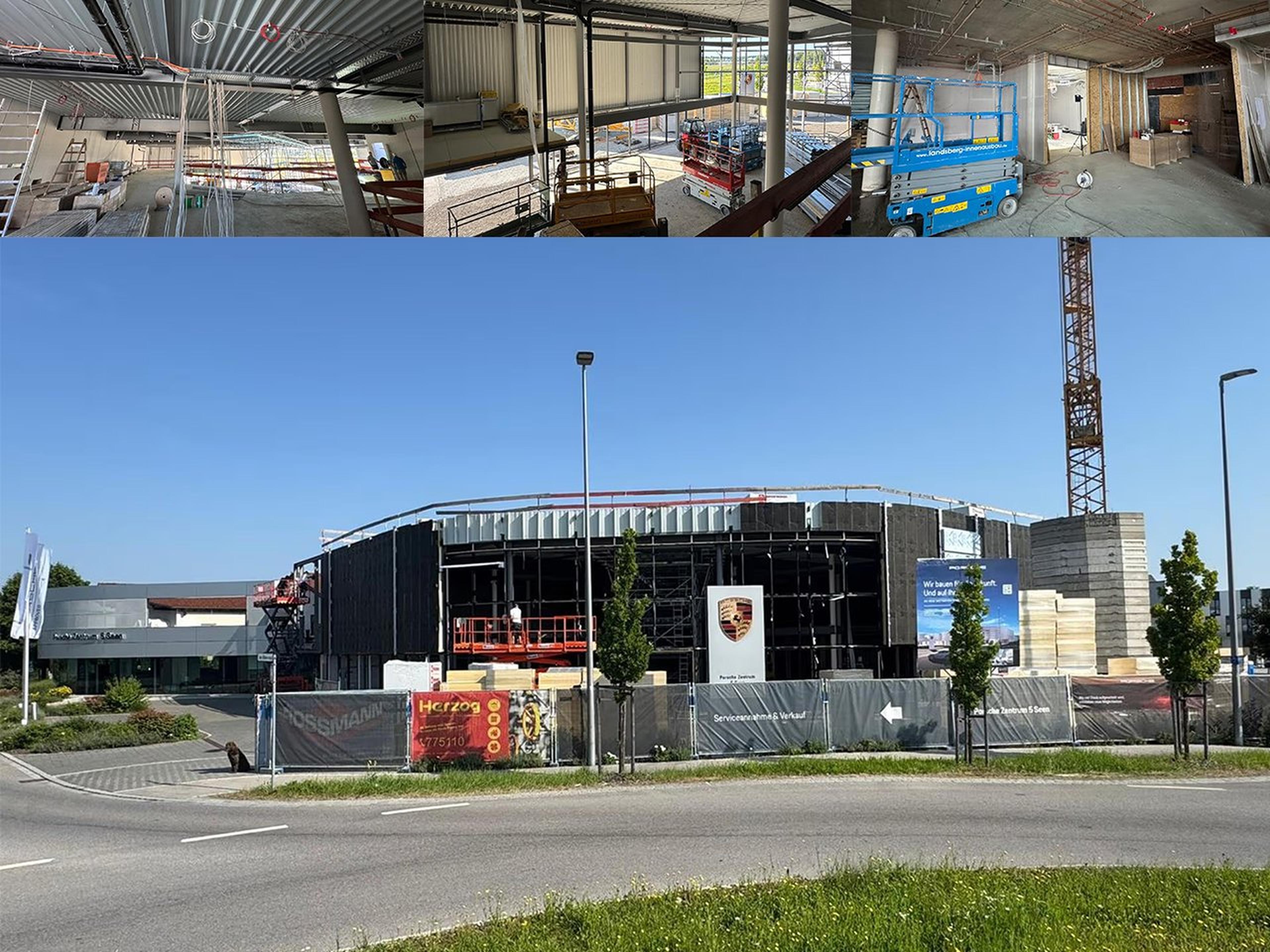 Baustelle eines modernen Gebäudes mit schwarzer Fassade und Porsche-Logo hinter Bauzaun an einer Straße bei klarem Himmel