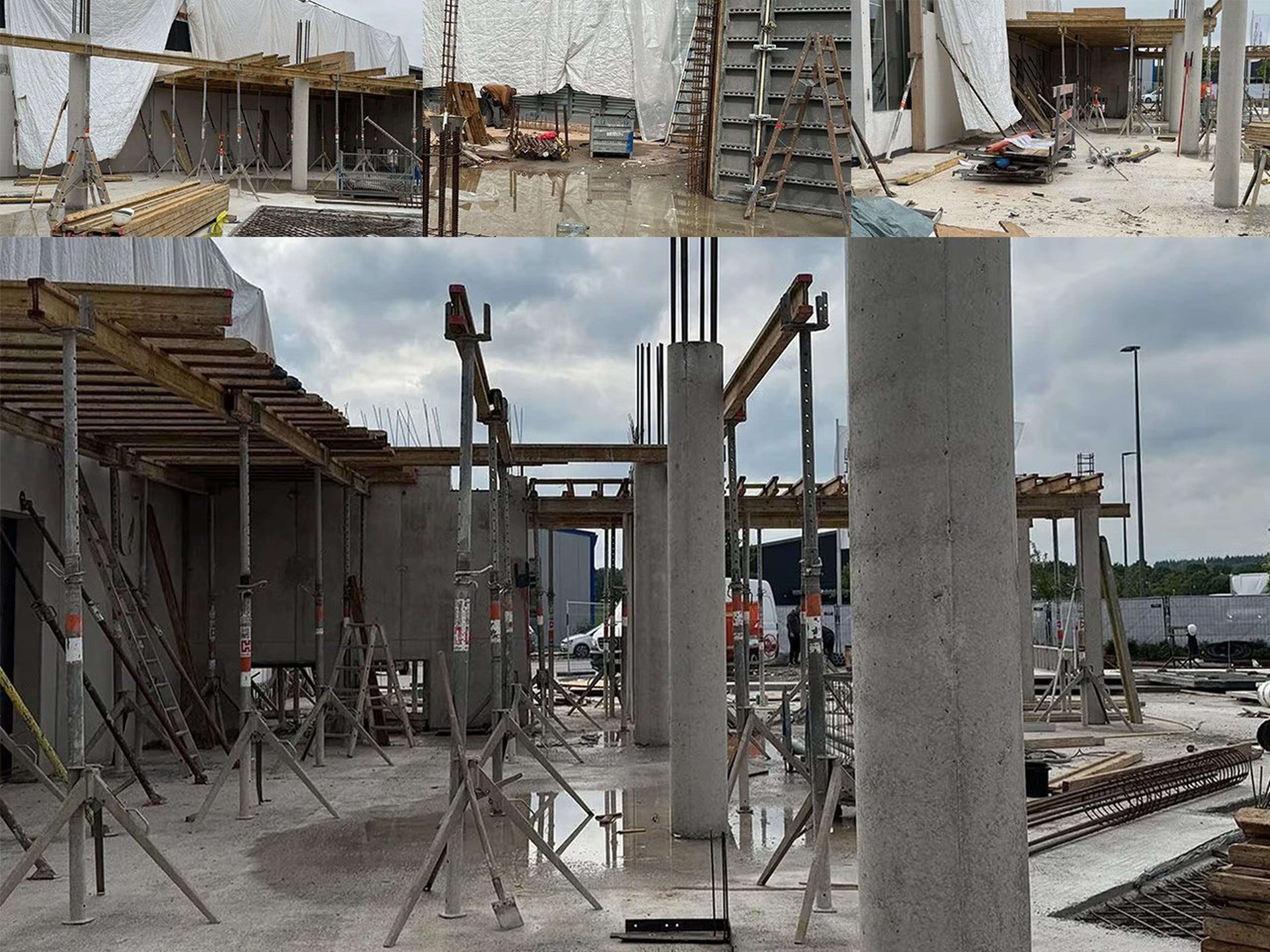 Baustelle mit Betonsäulen, Stützen und Schalungen unter bewölktem Himmel