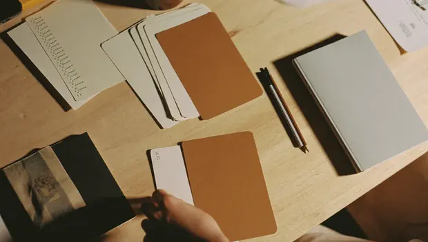 Brand collateral laid out on a designer's desk