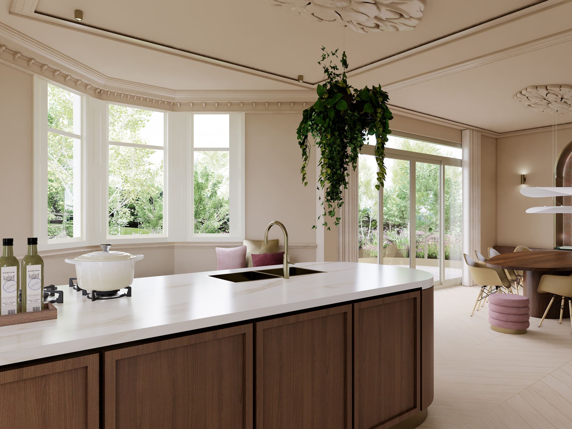 Interieurvisualisatie van de leefkeuken en eetkamer met walnoothouten eiland, zandtinten, hangplant en ronde eettafel voor Studio Nathalie Samson.
