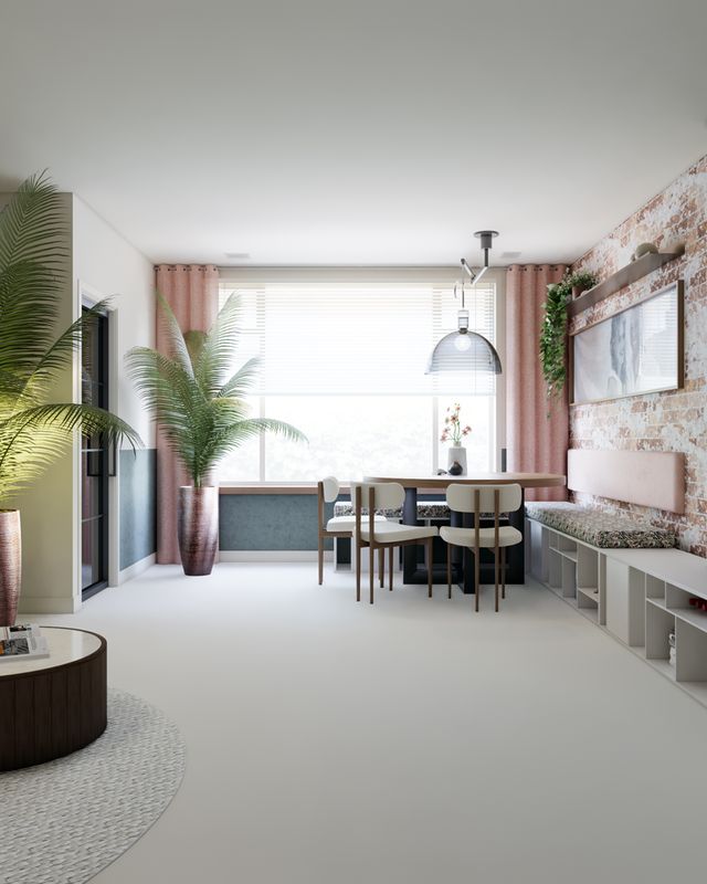 Interieurontwerp van een dorpswoning in Dinteloord met groene zithoek, ronde salontafels, eethoek en maatwerkwand van STOERR.