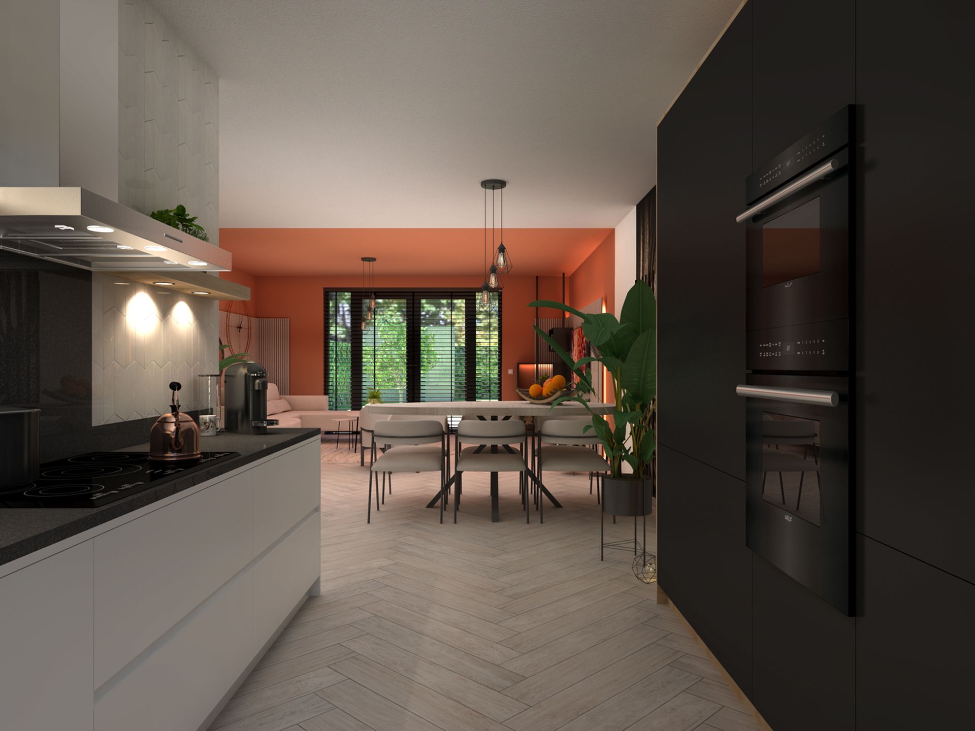 Zicht vanuit de keuken op het eetgedeelte en de woonkamer met terracottakleurige wanden en een lichte visgraatvloer.