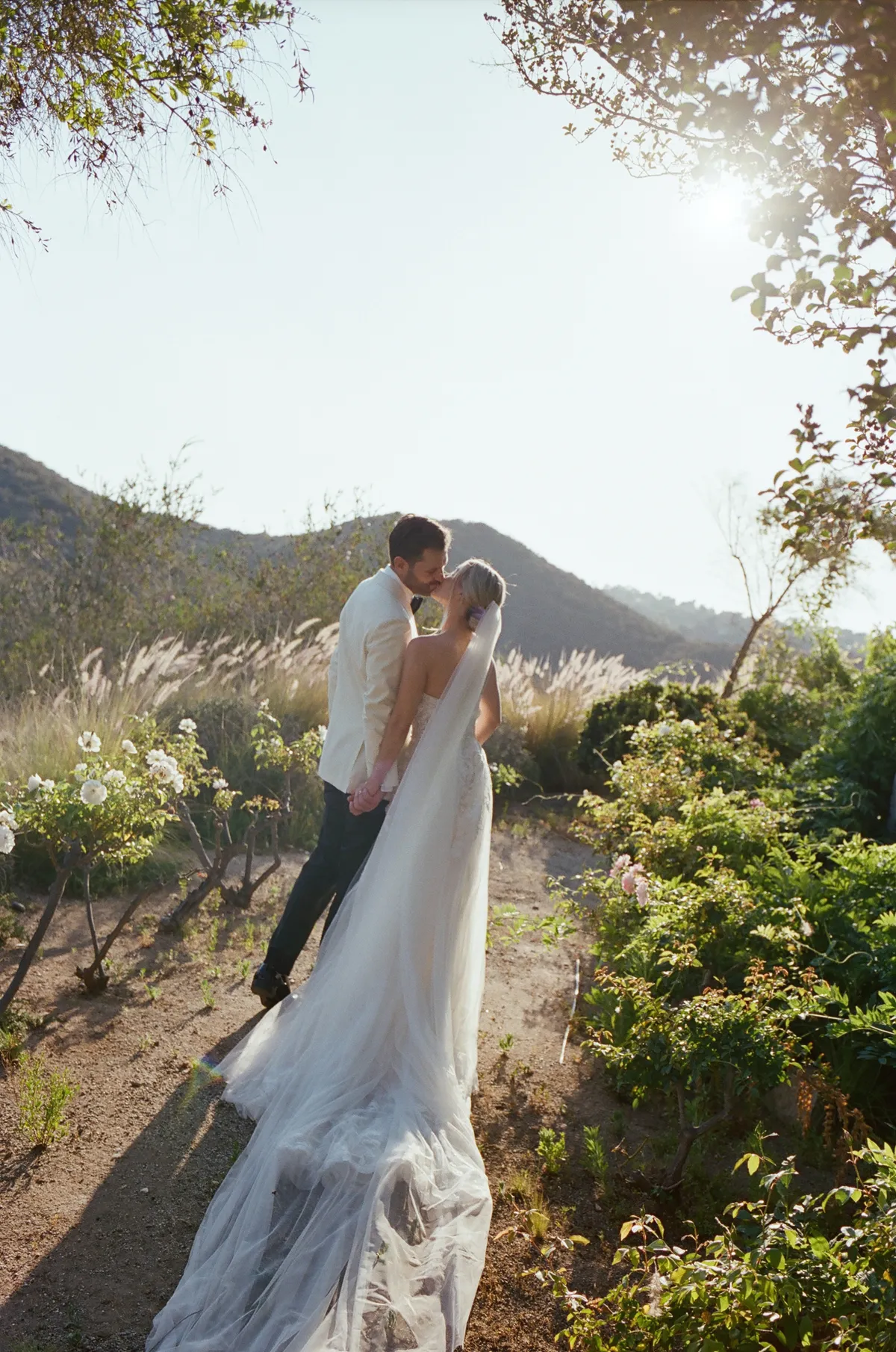 A newly married couple together in the gardens at Cal-a-Vie Health Spa