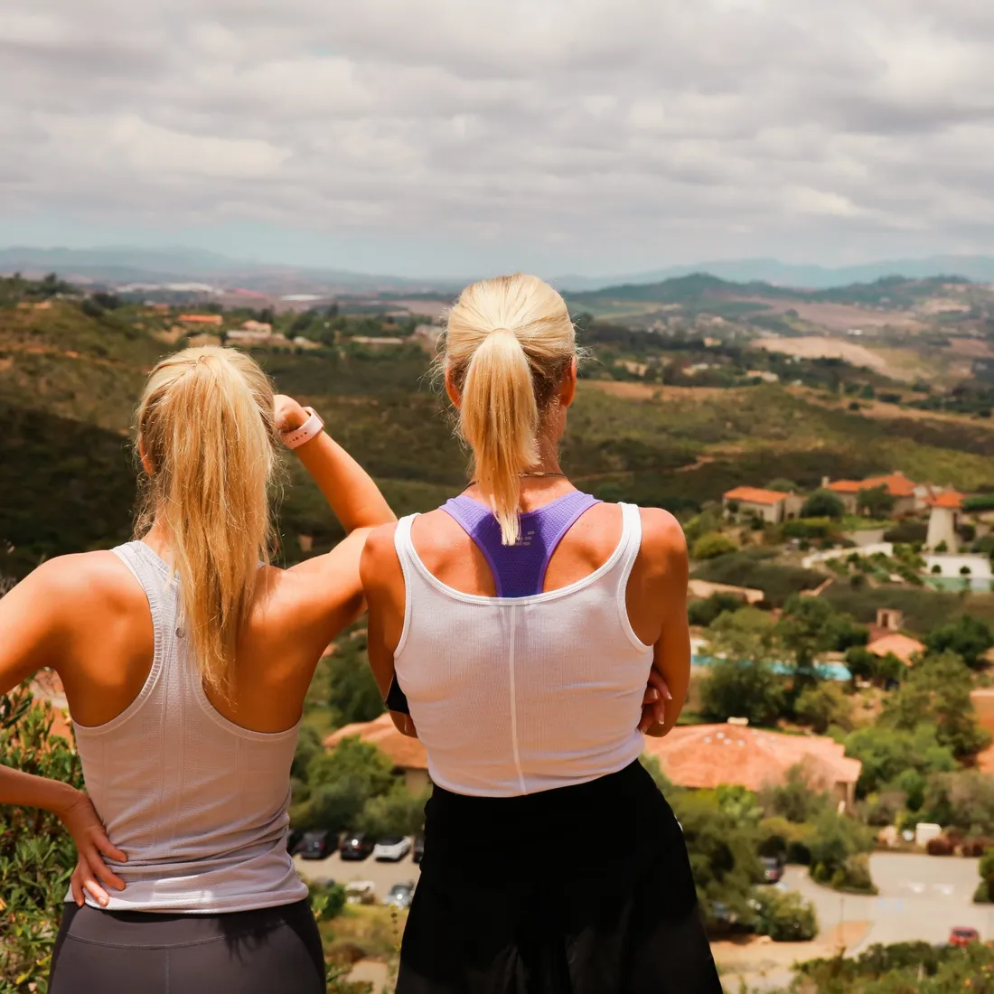 two women looking at a landscape