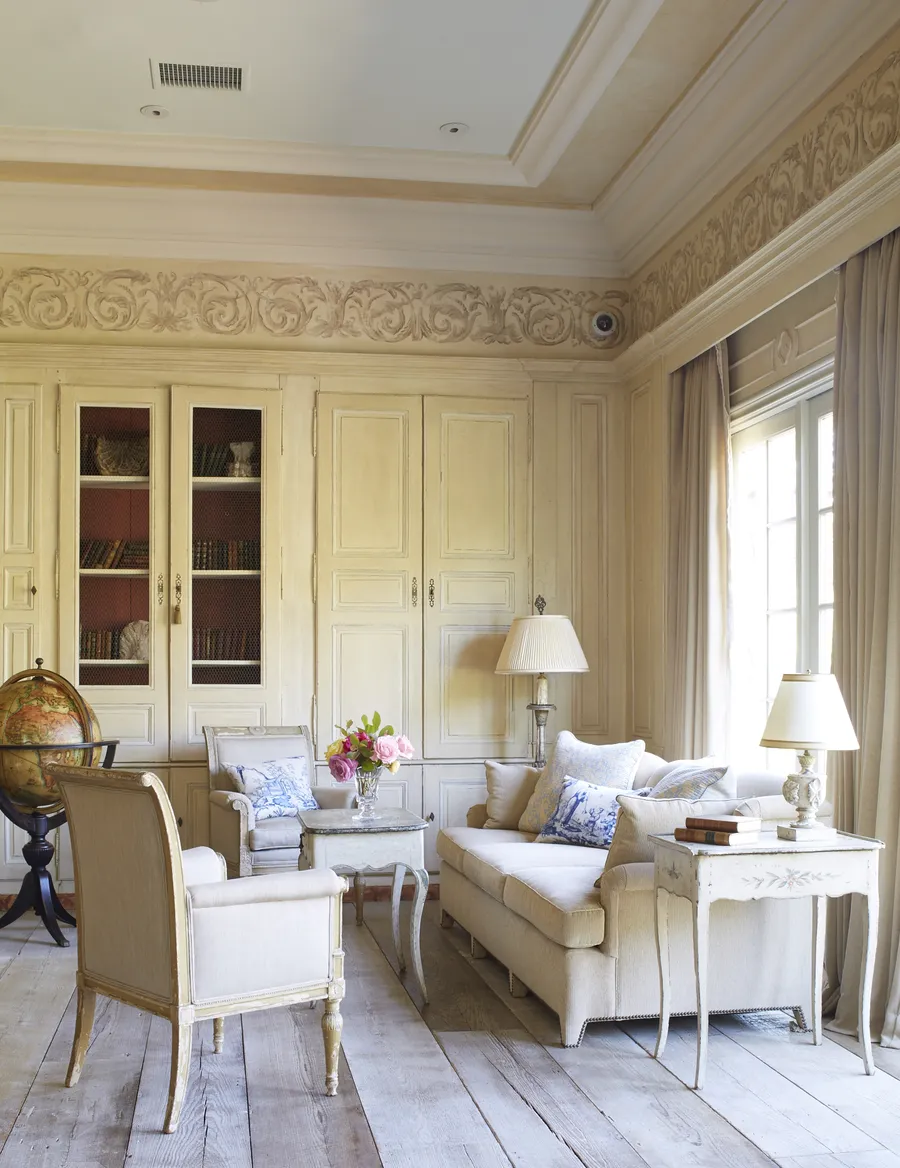 The Library at Cal-a-Vie — antique shelves and warm lamplight, a quiet room for one-to-one sessions