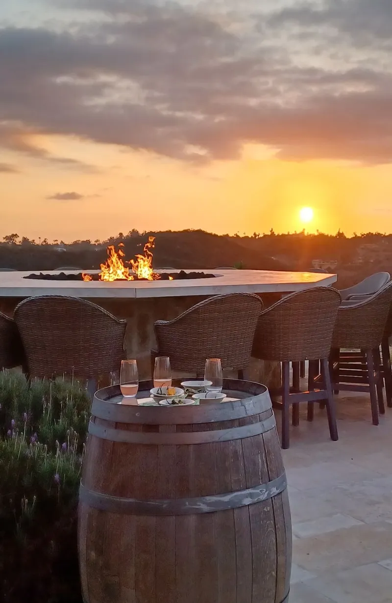 A long table set with estate wine at Cal-a-Vie, ready for a gathering of friends