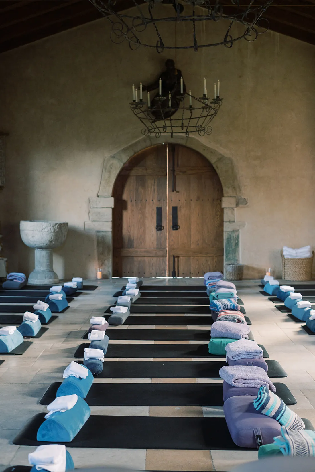 a group of towels on mats in a chapel