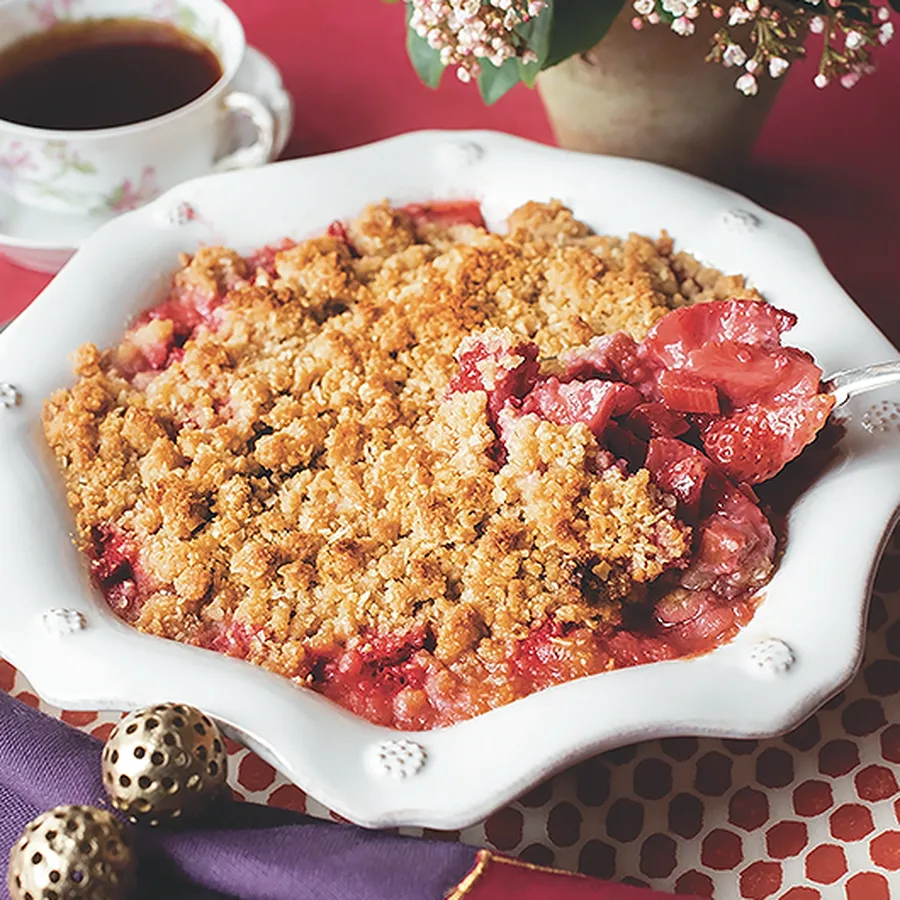 A ramekin of warm strawberry rhubarb streusel