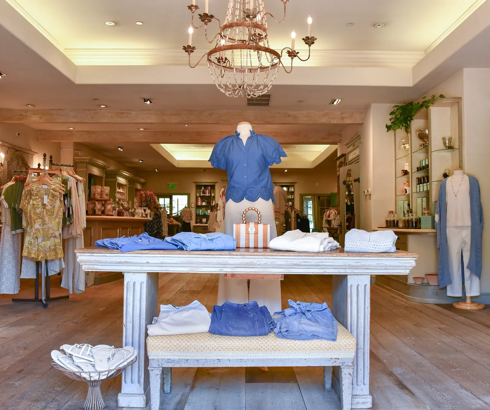 The Cal-a-Vie Boutique interior, warm light over curated home gifts, loungewear, and Provençal goods