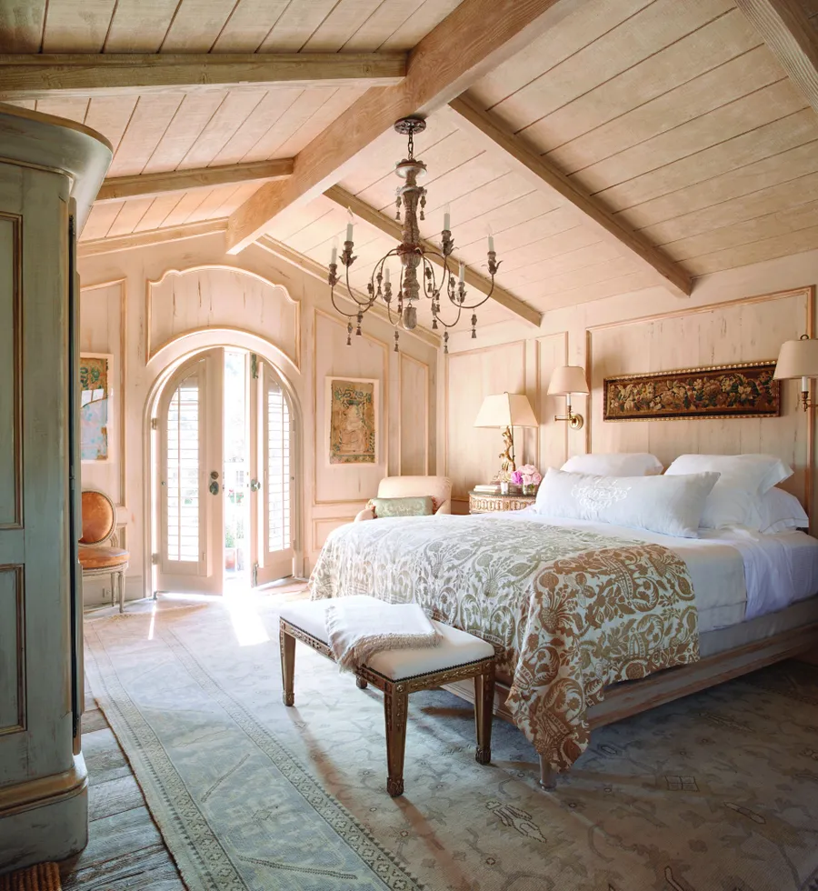 A Cal-a-Vie guest room dressed in warm neutrals, a robe and slippers set out and waiting for arrival