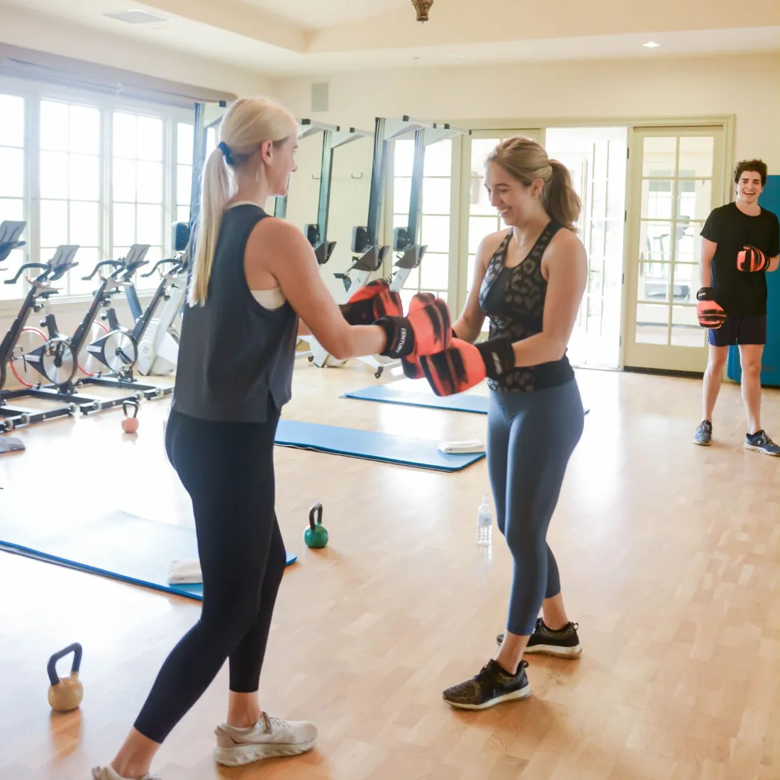 a group of people in a gym