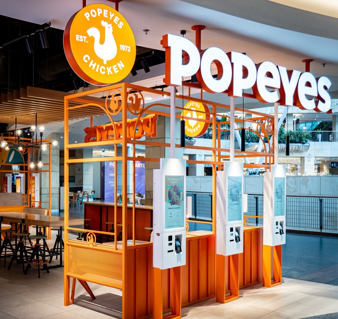 Popeyes self-ordering kiosks in a shopping centre restaurant