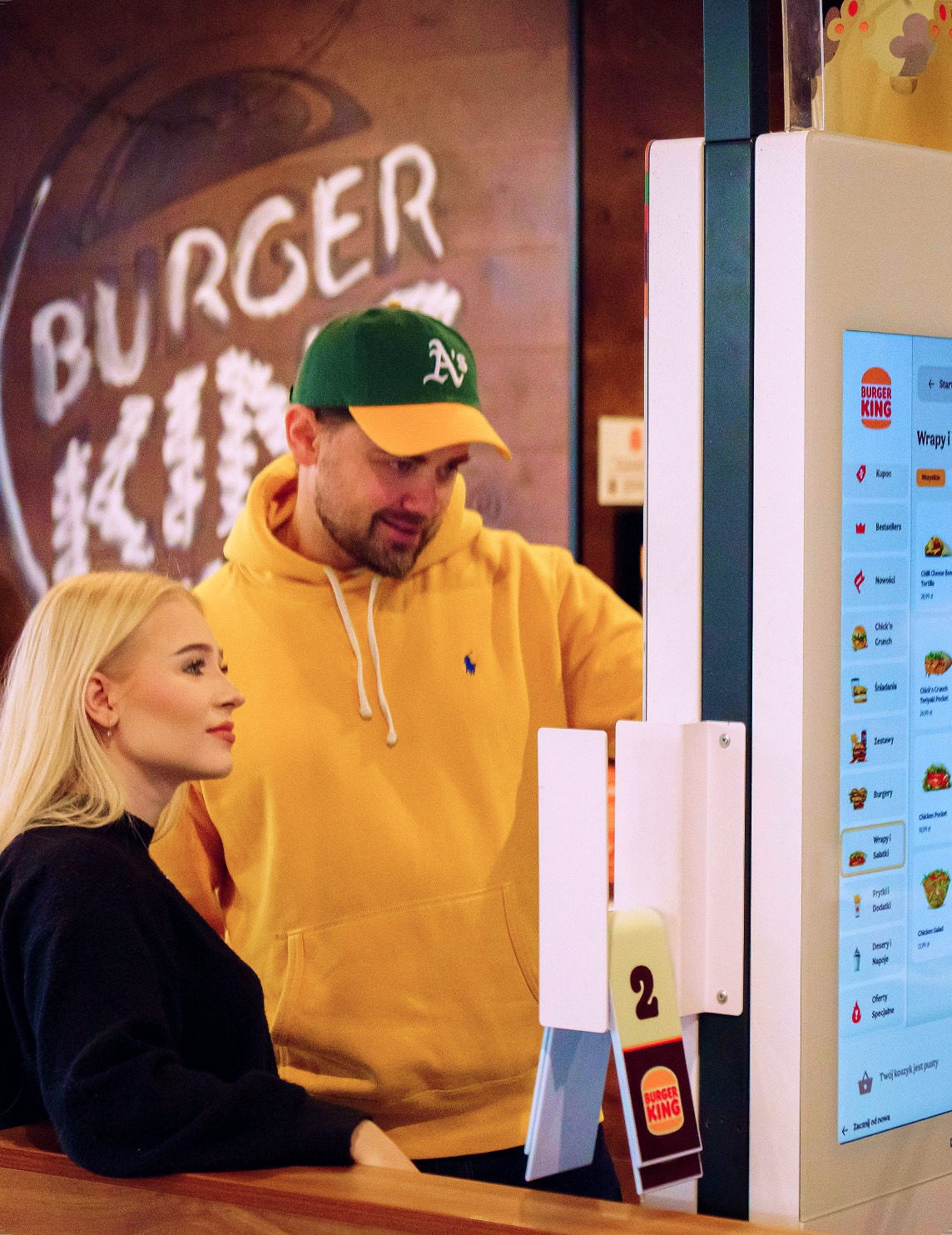Restaurant crew serving guests at the counter