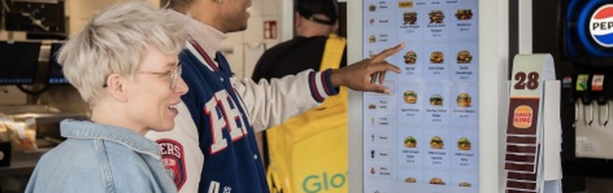 Self-service ordering kiosks in a Burger King restaurant