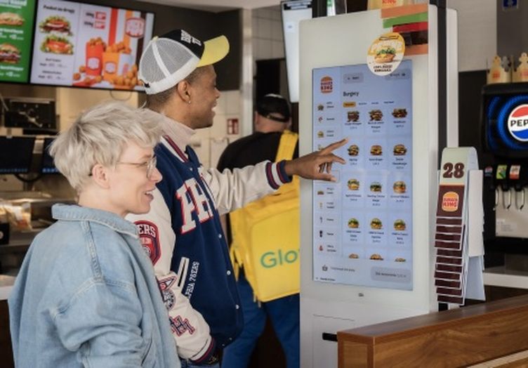 Self-service ordering kiosks in a Burger King restaurant
