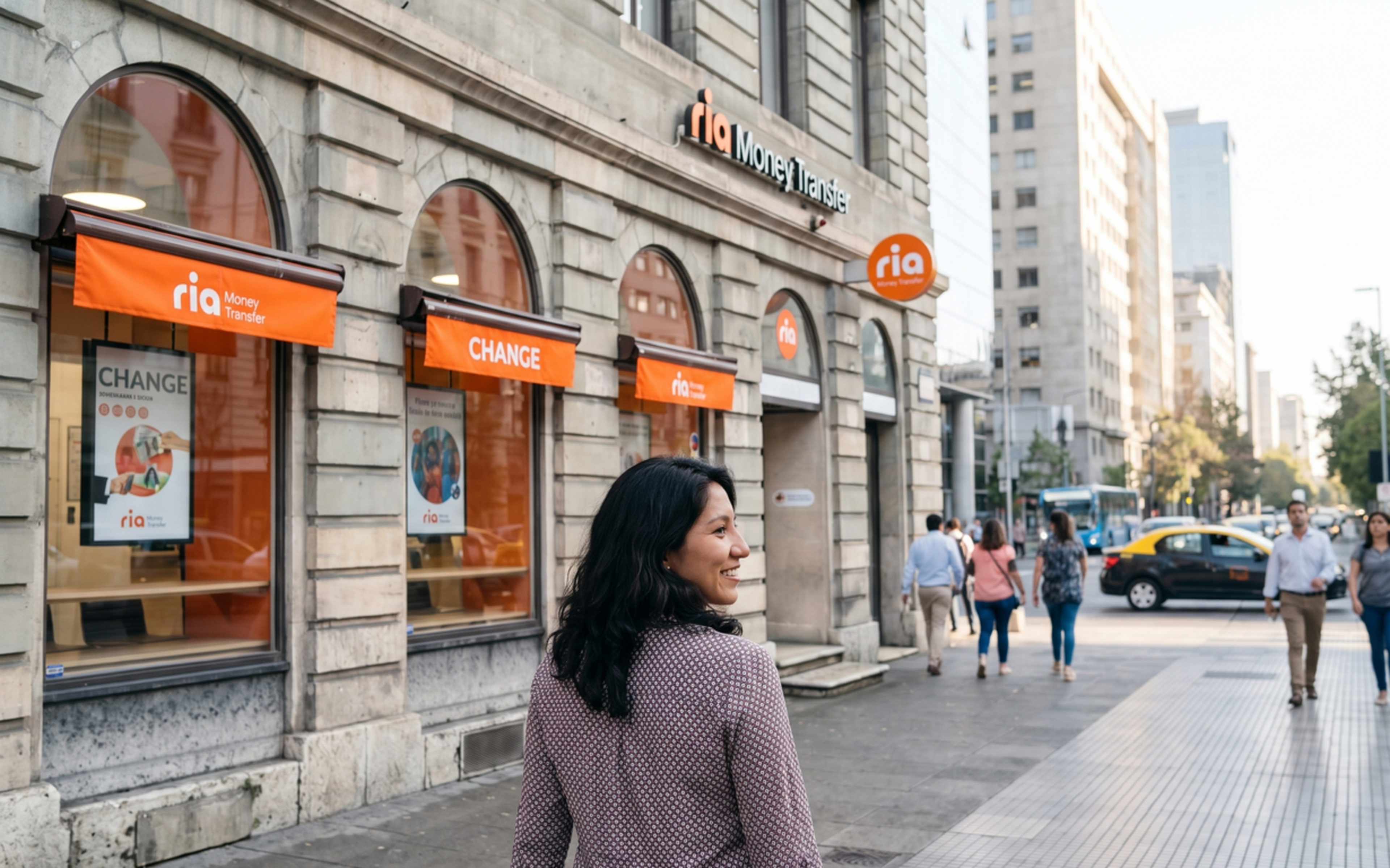 Woman walking past a Ria Money Transfer storefront with orange signage and "CHANGE" window displays on an urban street.