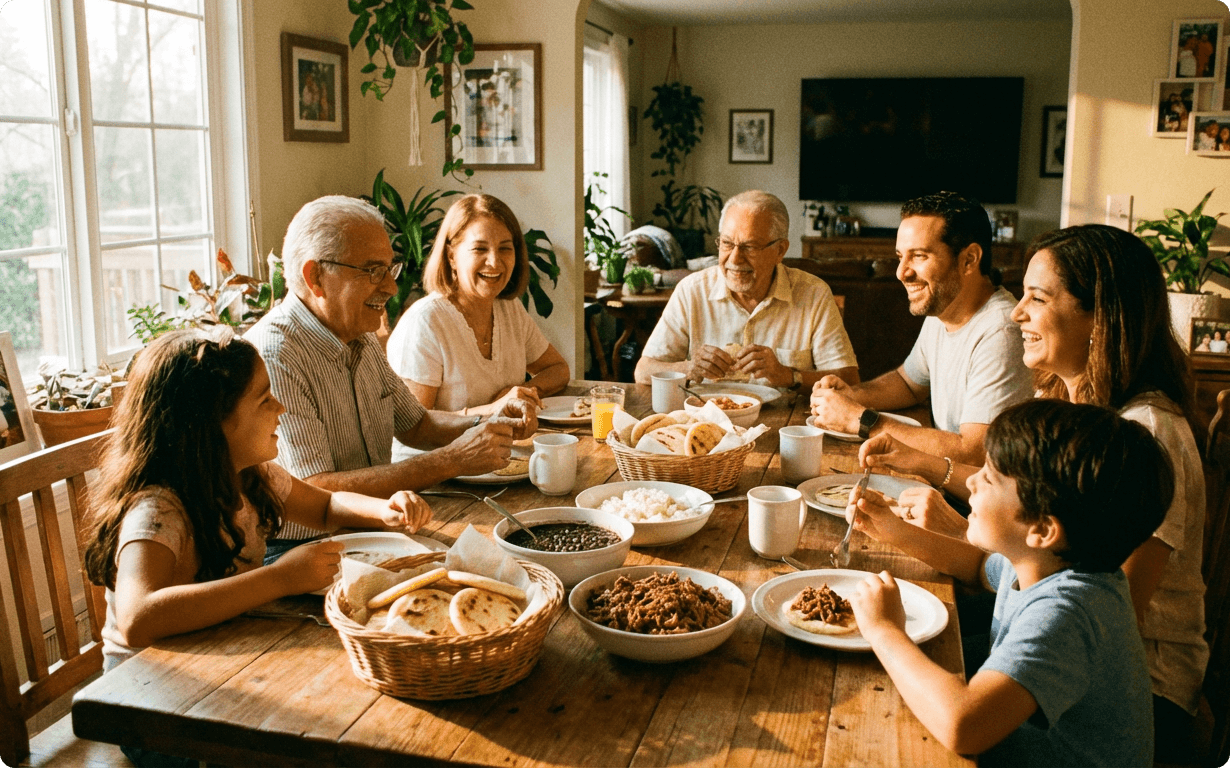A multi-generational family sits around a wooden dining table, smiling and sharing a meal together. The cozy scene captures the warmth of staying connected, even from afar—like when loved ones send money to Venezuela to support each other.