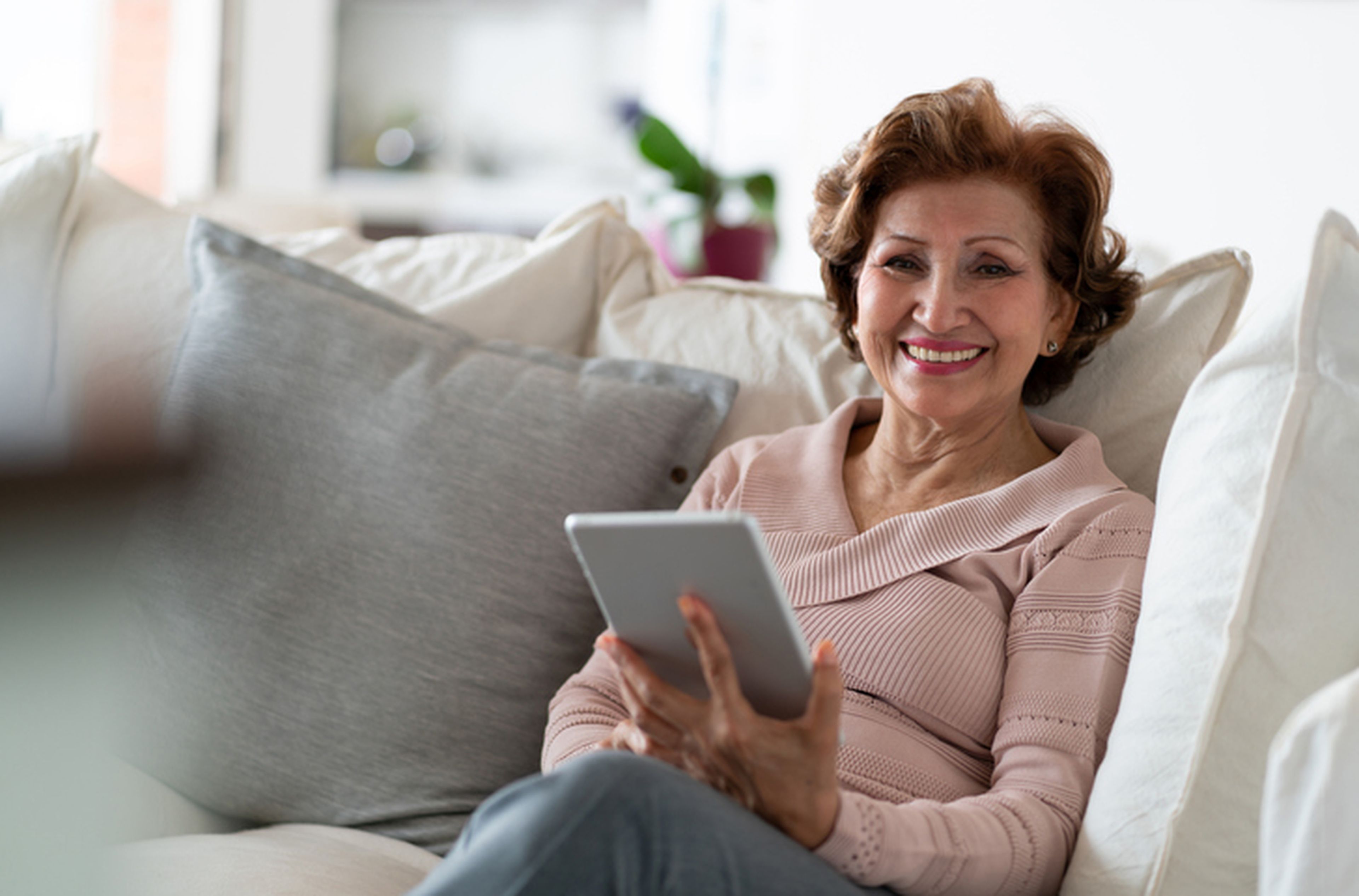 Woman sitting on couch