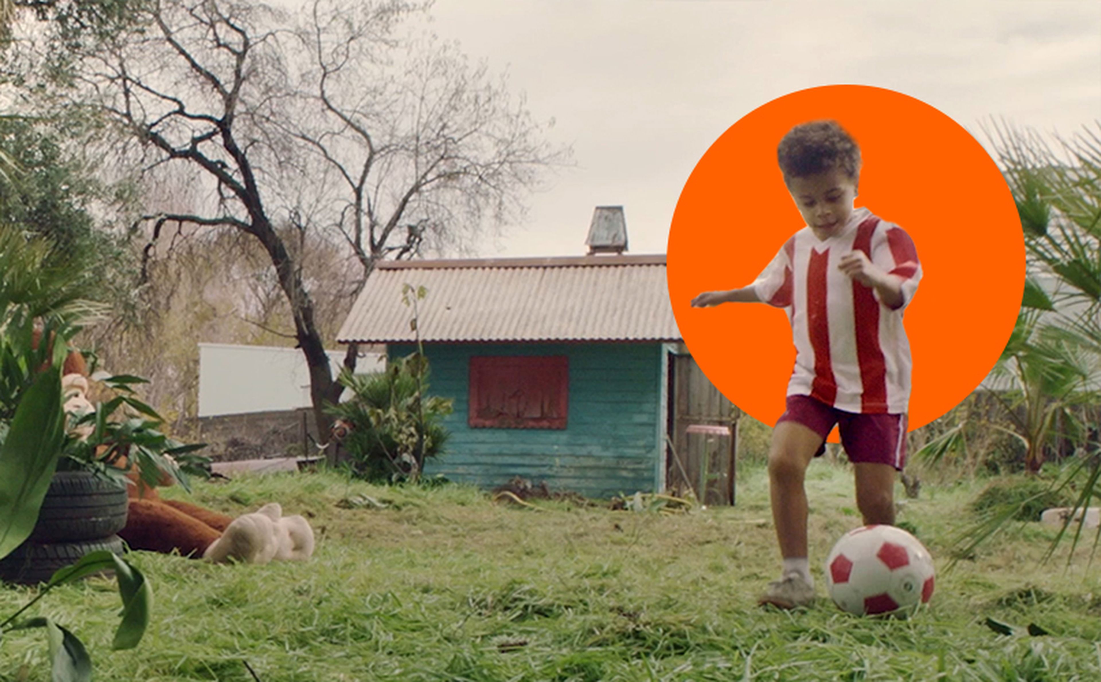 atletico de madrid kid playing football ria money transfer orange disc