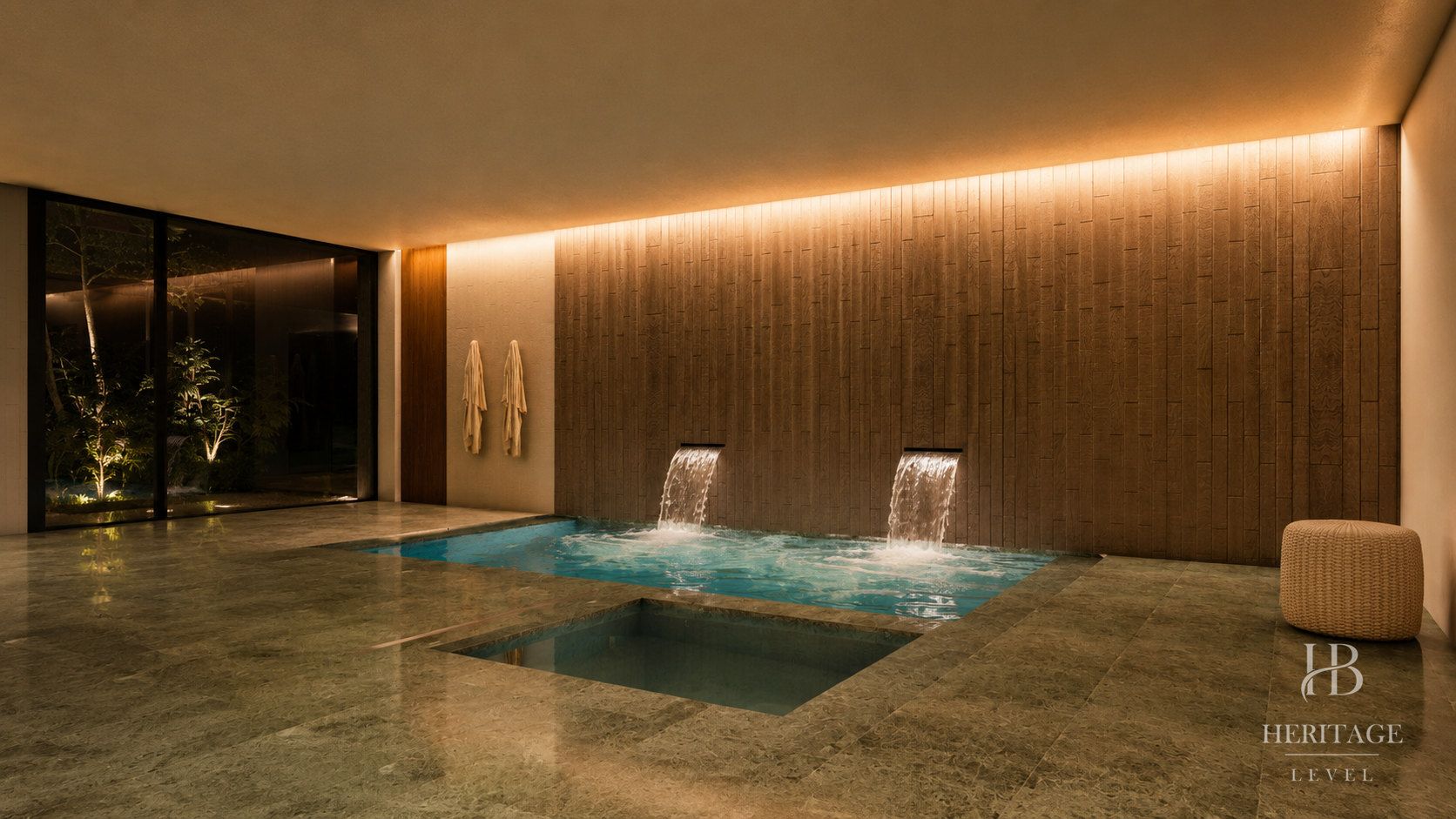 Spa interior de KEYSTONE con la piscina y la pared de cascada
