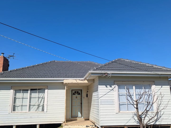 Melbourne tile roof after restoration, recoated and watertight