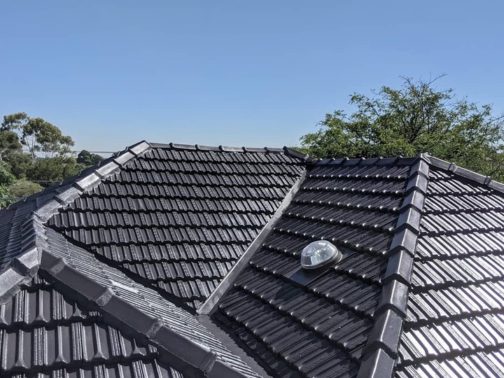 Melbourne tile roof after restoration, recoated and watertight