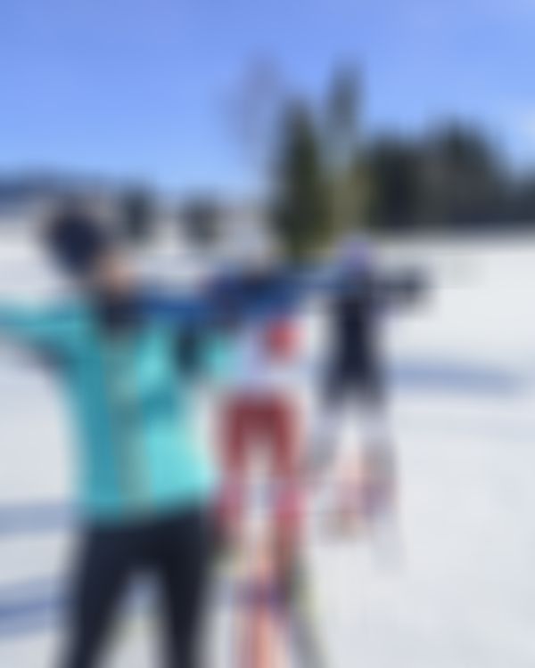 3 Personen beim Laser-Biathlon