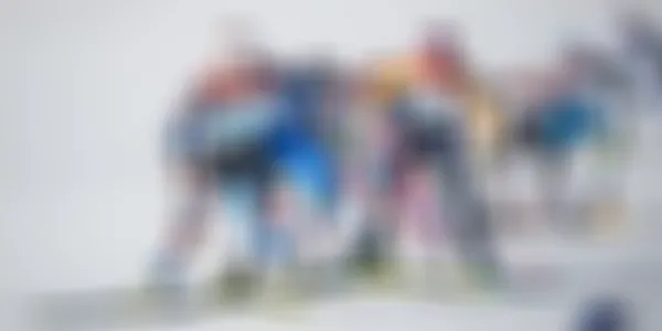 Cross country skiers batteling for position in a competition