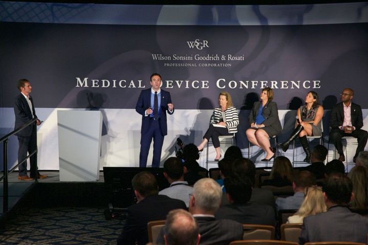Speaker and panelists on stage at the WSGR Medical Device Conference during MedTech Innovator Summit 2018