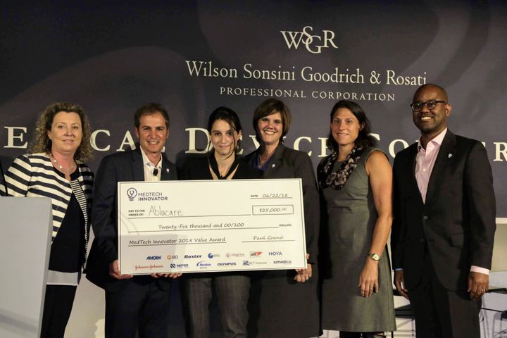 Ablacare team receiving the $25,000 MedTech Innovator 2018 Value Award check at the WSGR Medical Device Conference