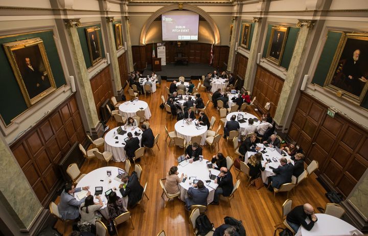 Overhead view of round-table meetings at the MedTech Innovator Dublin Pitch Event hall