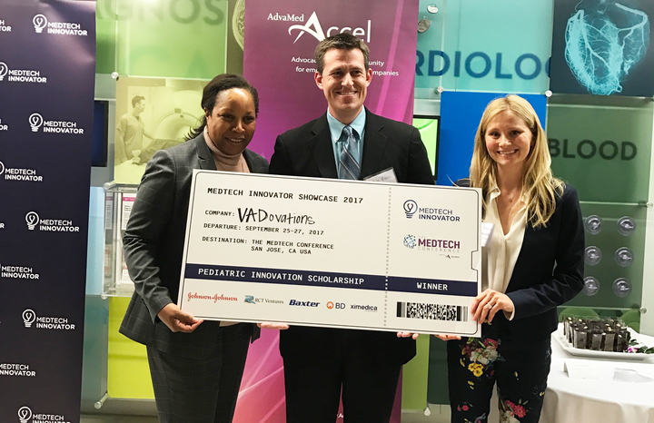 VADovations team holding the 2017 MedTech Innovator Pediatric Innovation Scholarship winner ticket