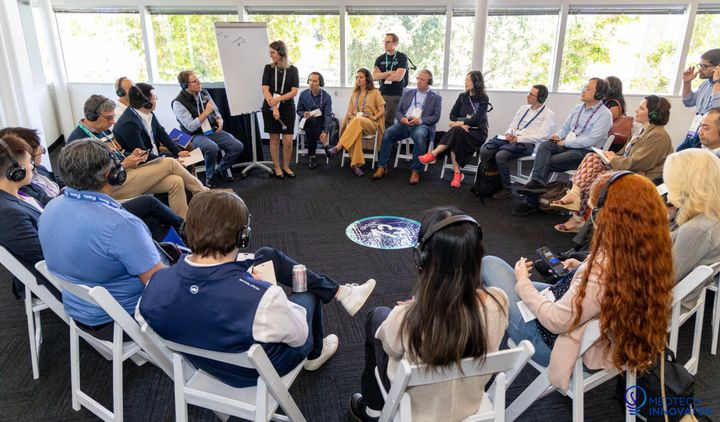 Cohort founders seated in a circle for a partner-led breakout discussion at Innovator Summit 2024