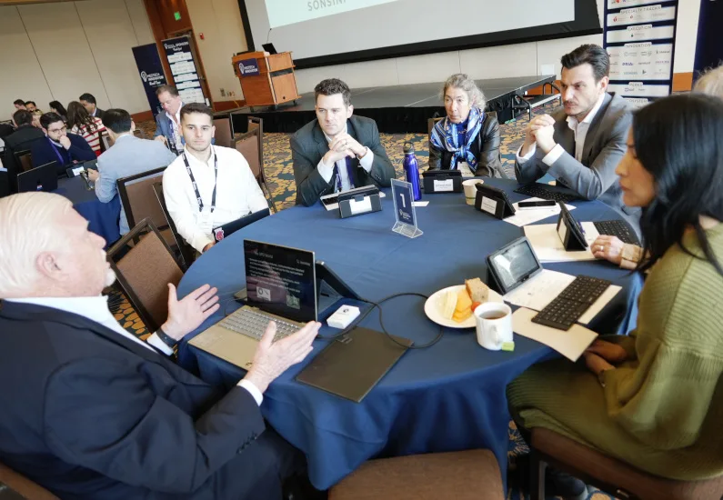Judges and founders at a 2025 pitch event