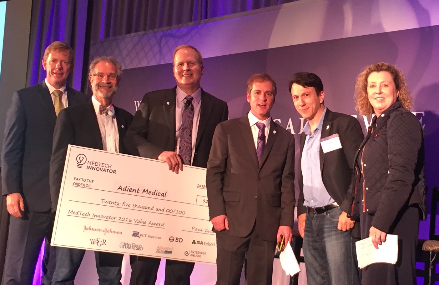 Adient Medical team on stage receiving the MedTech Innovator 2016 Value Award check