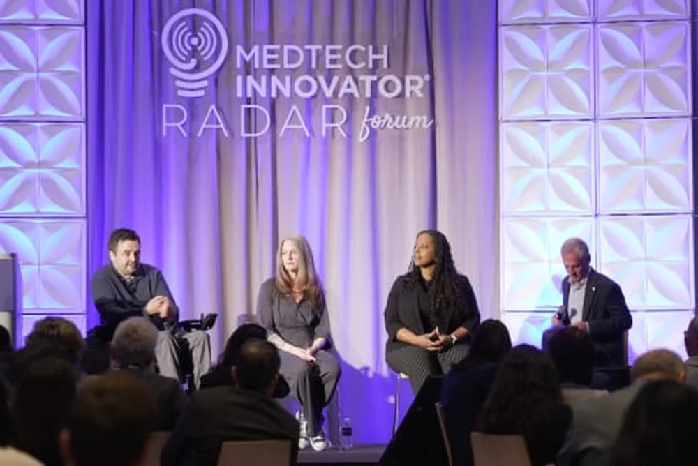 A panel discussion on stage at the MedTech Innovator Radar Forum