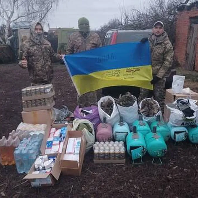 Børn modtager hjælp i Ukraine